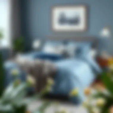 Stylish arrangement of blue grey bedding with complementary decor