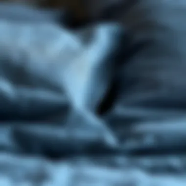 Close-up of fabric textures in blue grey bedding