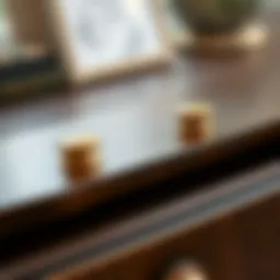 Sophisticated brass cup pulls on antique drawer
