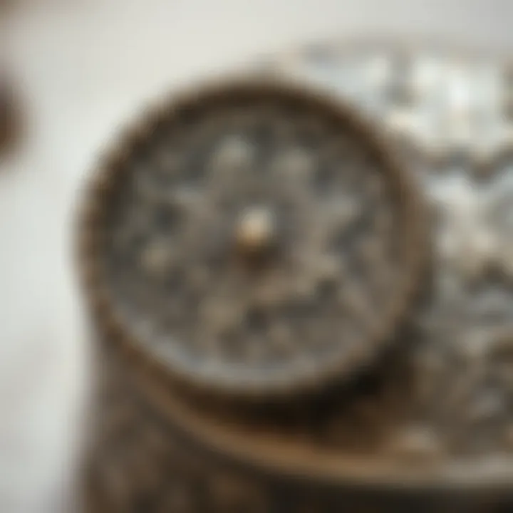Elegantly Adorned Metal Box Lid Close-up view of a finely crafted metal box lid adorned with elegant motifs
