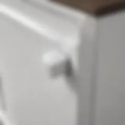 Elegant white plastic handle on modern furniture