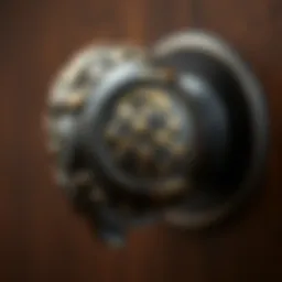 Close-up view of rustic black cabinet knob showcasing intricate design details
