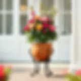 Elegant outdoor pot stand with wheels showcasing a vibrant flower arrangement.