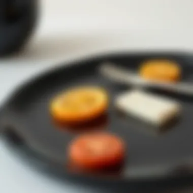 Notable The Aesthetic and Functional Aspects of the Large Black Plate Notable The Aesthetic and Functional Aspects of the Large Black Plate