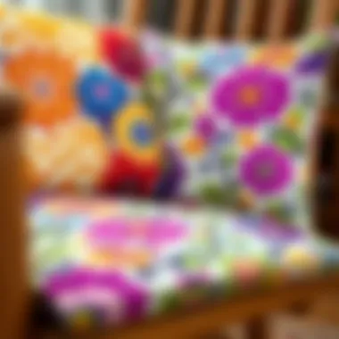 A close-up of vibrant fabric patterns on rocking chair cushions